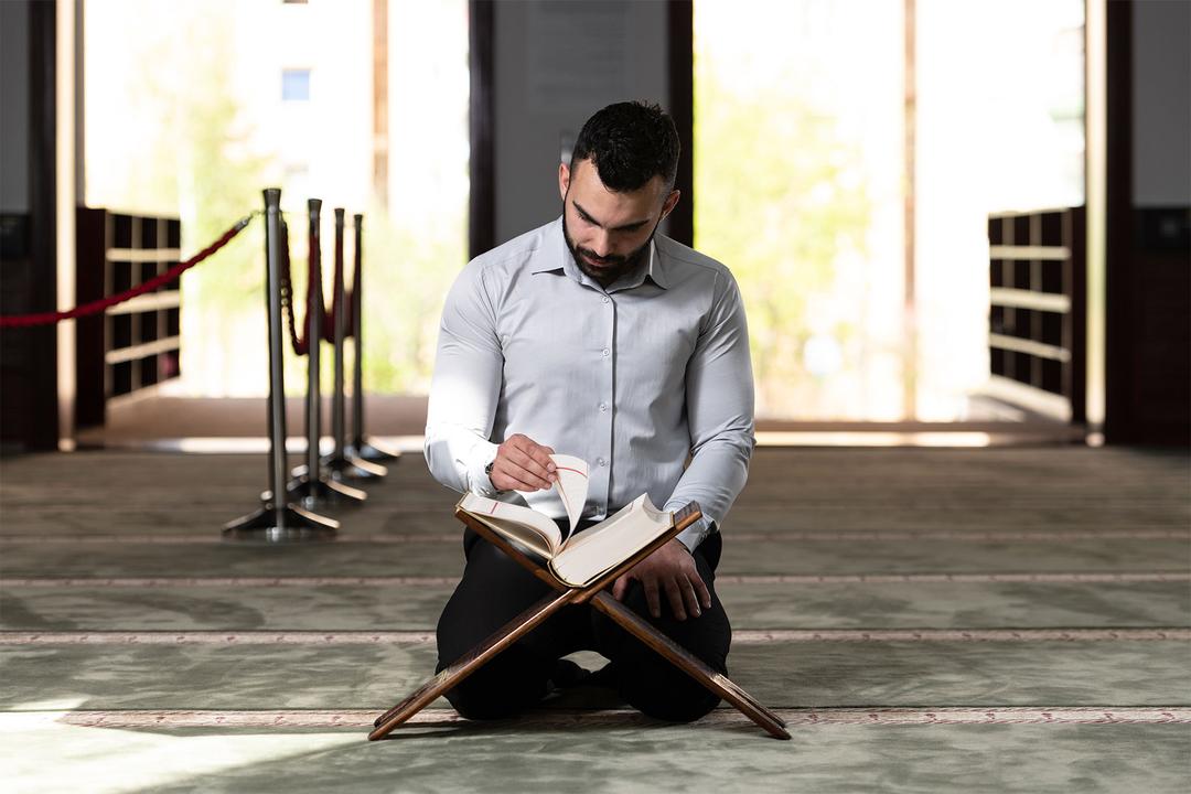 Single Muslim UK reading Quran during Ramadan